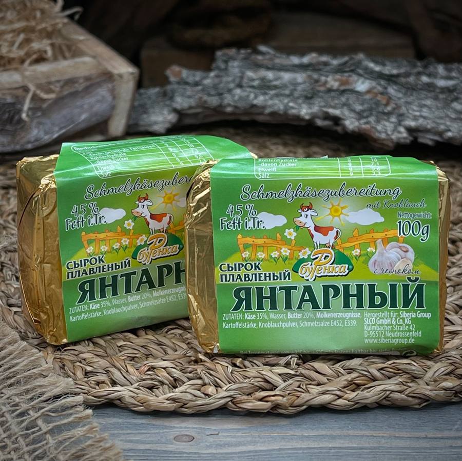 Янтарный сыр плавленый с чесноком "Буренка" — фото 3