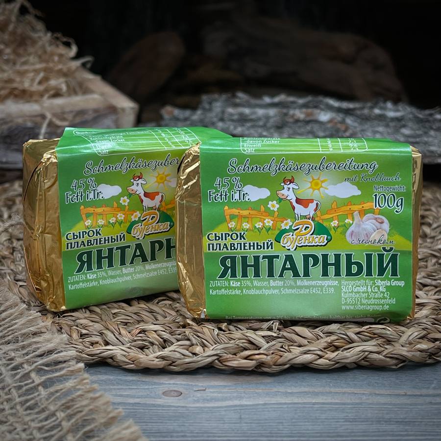 Янтарный сыр плавленый с чесноком "Буренка" — фото 2