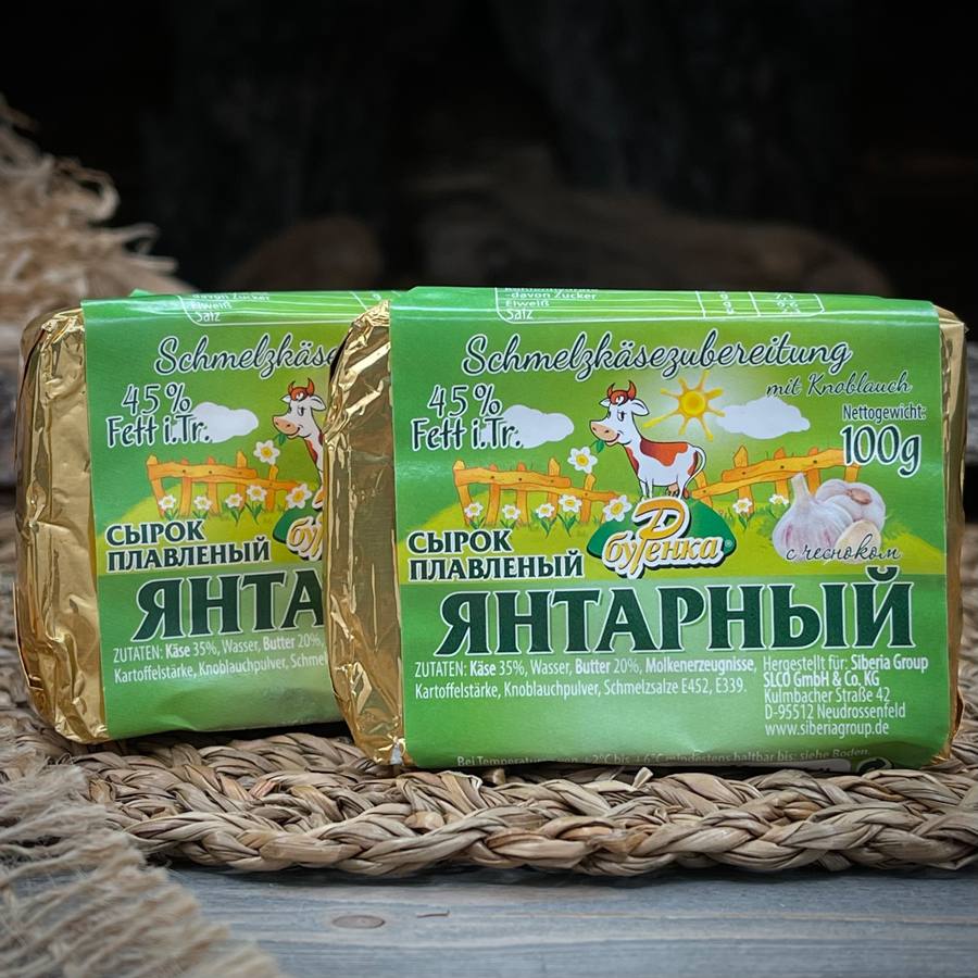 Янтарный сыр плавленый с чесноком "Буренка" — фото 4